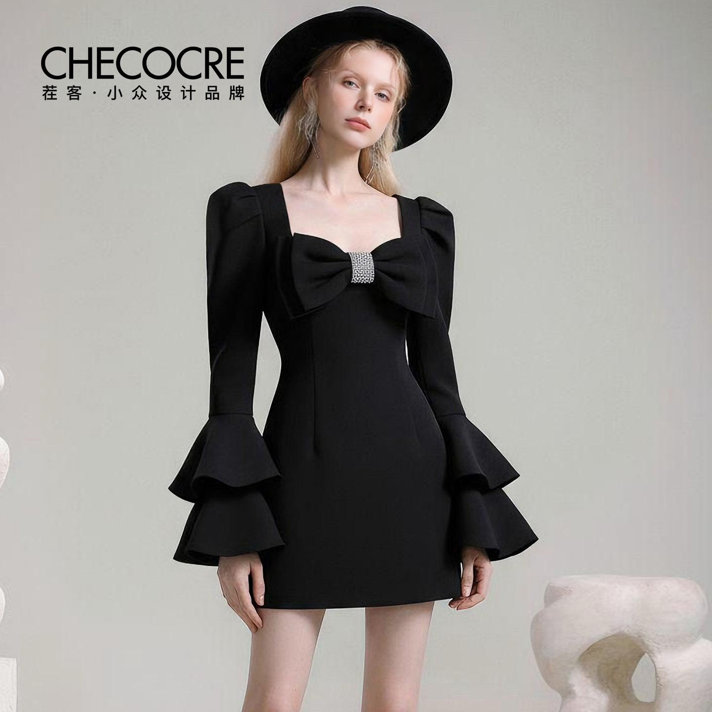 茬客蝴蝶结喇叭袖短裙