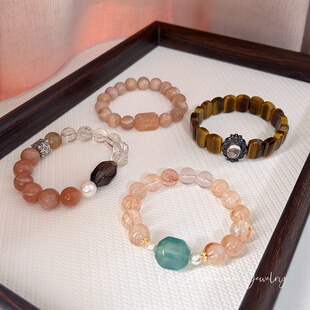 天然水晶芬达胶花橙月光幽灵黑金超幽灵虎眼女款 石手串手链招财