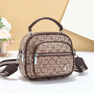 百搭实用型女士斜挎手提包2026新款上班通勤中年妈妈包多层大容量