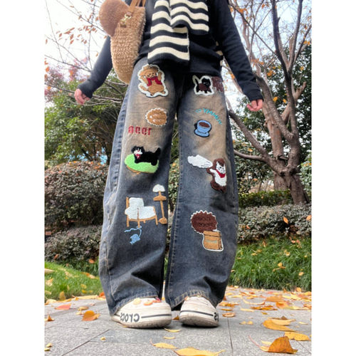 大码美式复古卡通刺绣弯刀牛仔裤