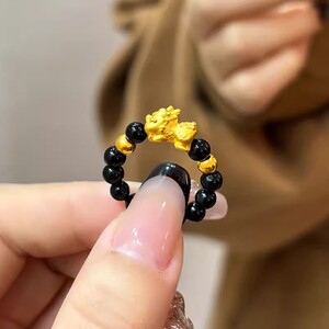黄金貔貅宝宝戒指新款黑曜石转运珠999足金弹力绳指环24K纯金戒子