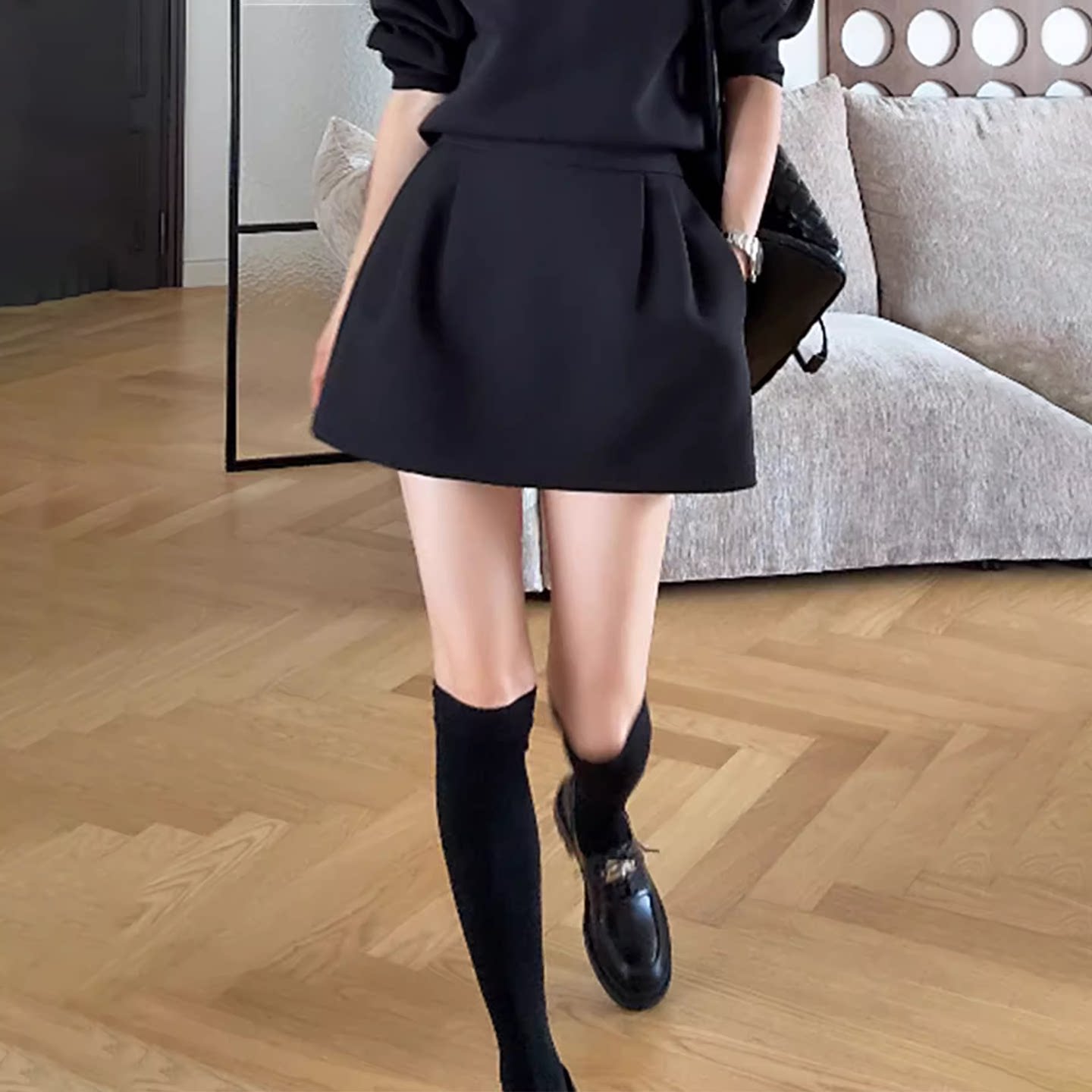 黑色毛呢A字半身裙女秋冬配靴子时尚百搭高级感高腰显瘦花苞短裙