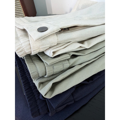 松紧腰单粒扣设计男士休闲裤