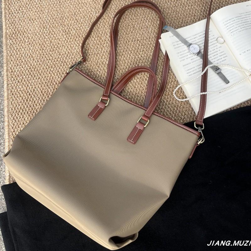 2024冬季新款尼龙布配油蜡牛皮上班通勤出差百搭单肩手提托特包大