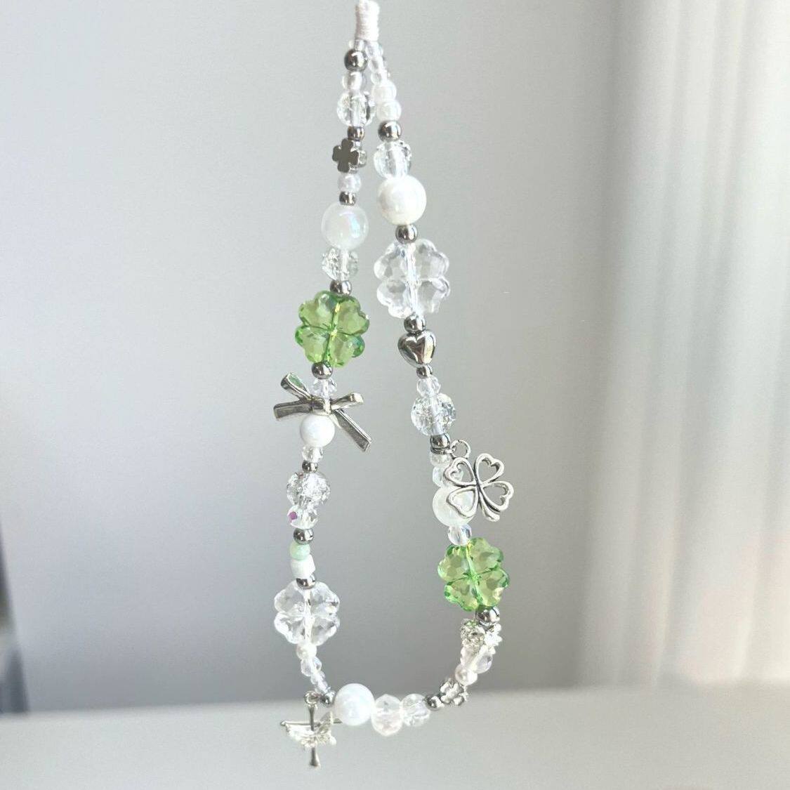 幸运四叶草多色串珠粉手机链防丢相机挂件女学生闺蜜礼物ccd挂绳