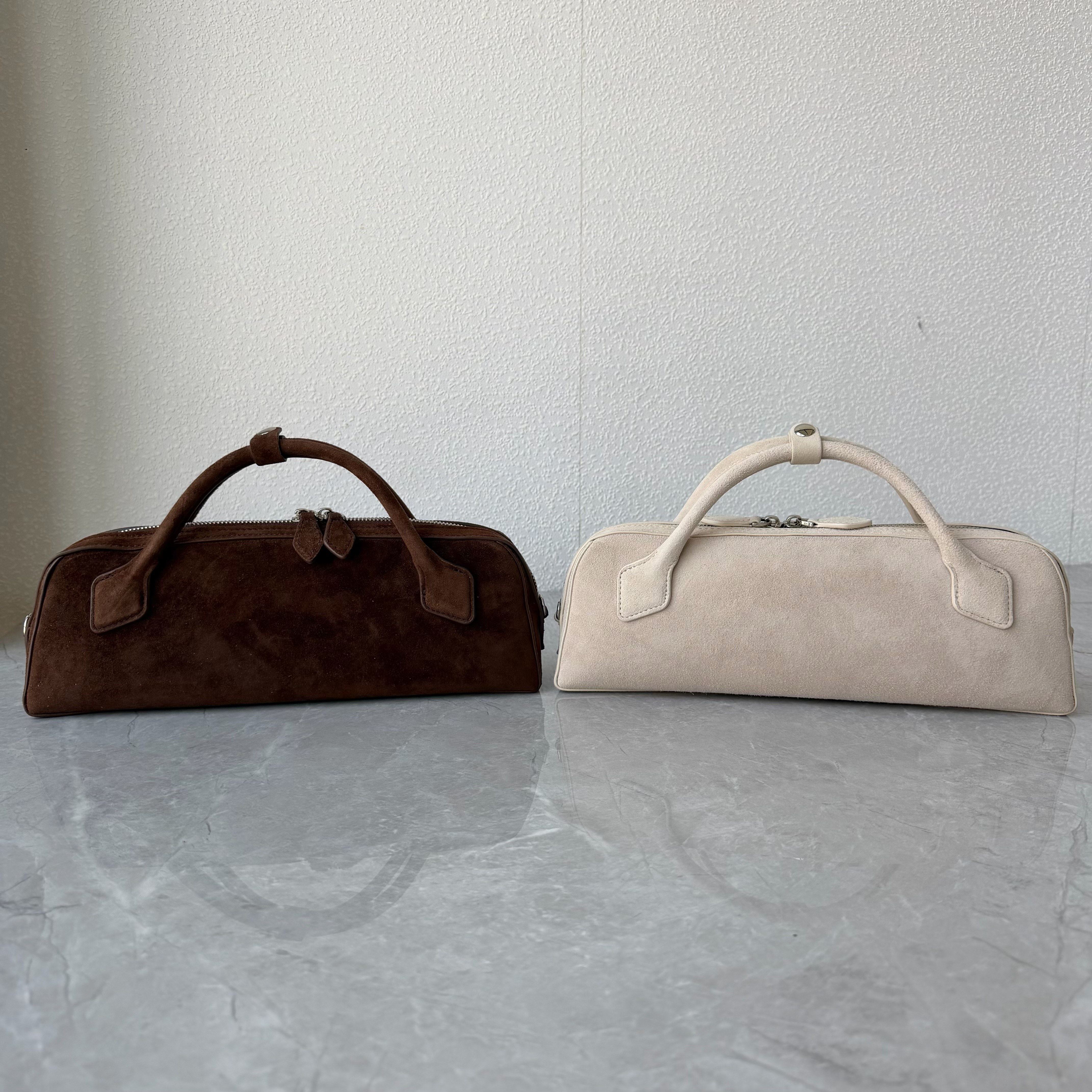 羊京绒高品质小众设计法棍包真皮气质手提包时尚百搭斜跨包腊肠包