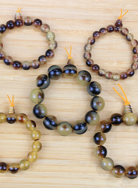 地摊景区热卖仿蜜蜡牛角佛珠手链义乌饰品男女时尚仿羚羊角手串