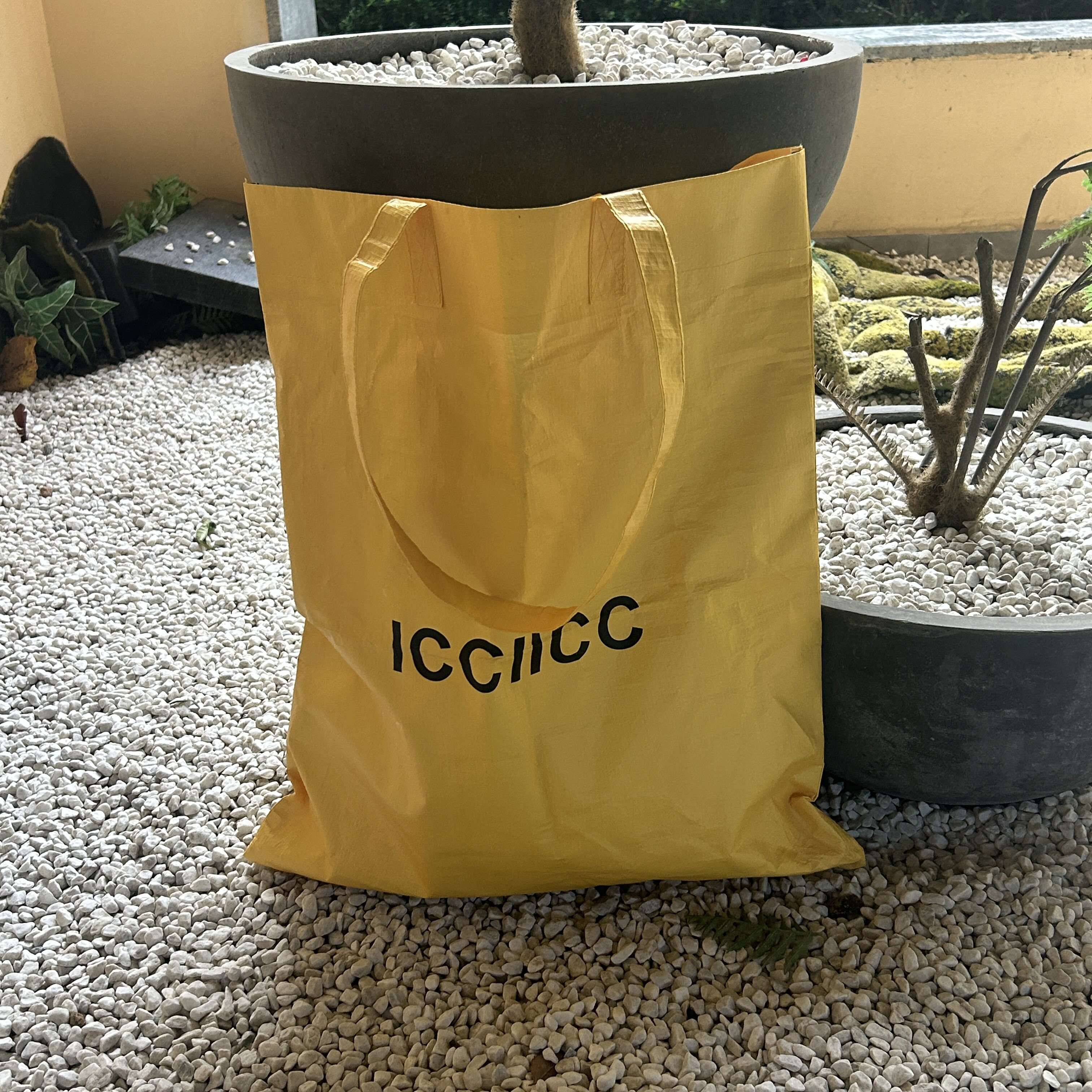 明黄服装店编织手提袋高端买手防水包装袋子纸袋购物眼包定制