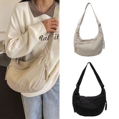 帆布包女2025新款斜挎大容量韩系慵懒风上班通勤饺子包单肩托特包