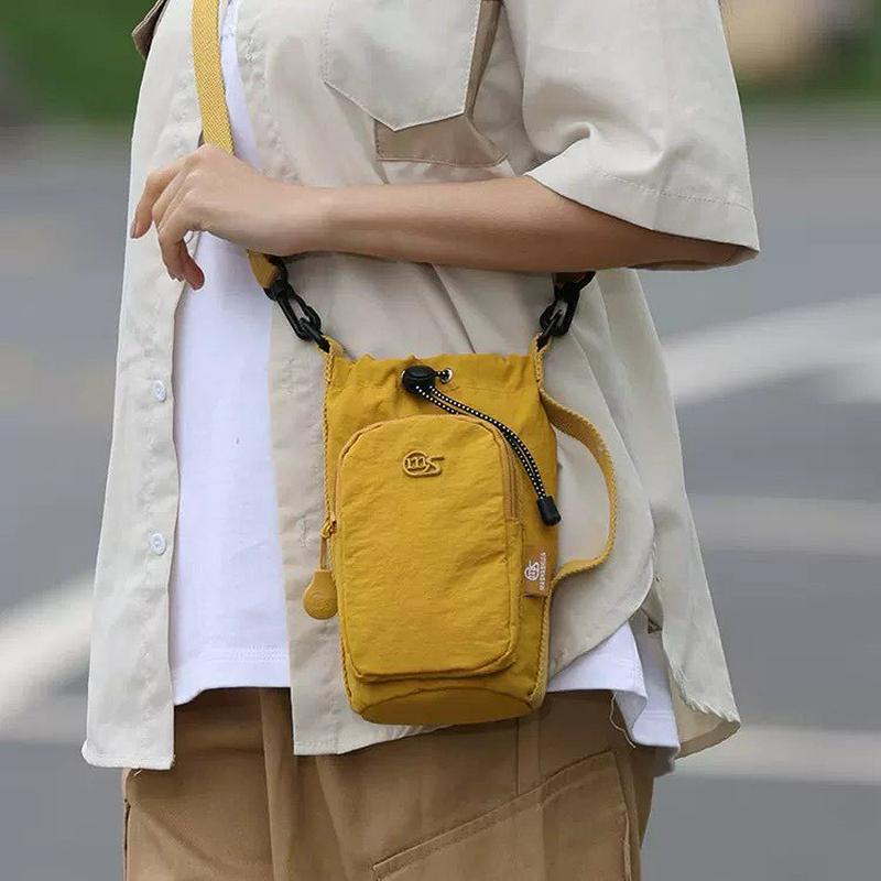 斜挎手机包女2025新款小众设计款多功能户外水壶包时尚百搭单肩包