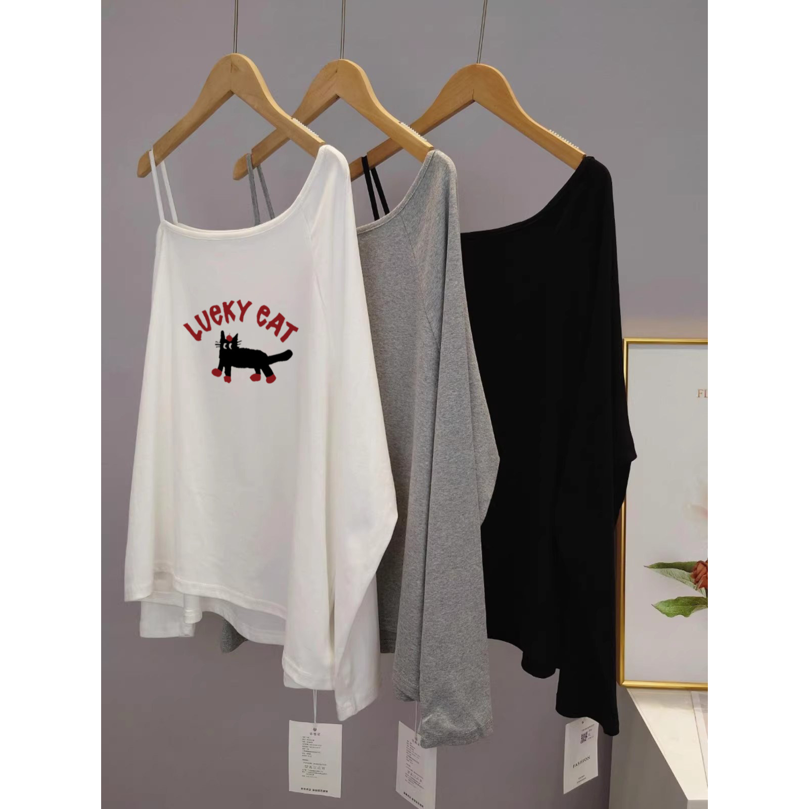 狠狠期待住春天~不规则露肩斜领长袖T恤女慵懒风宽松一字肩上衣