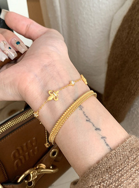 v金材质保色拉丝莺尾花手链女时尚天花板手饰品双面可戴手饰品