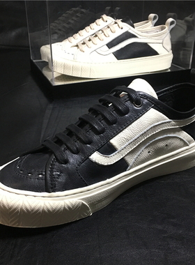 春季休闲男鞋欧洲站潮鞋青年厚底小白鞋黑白拼色雕花透气真皮板鞋