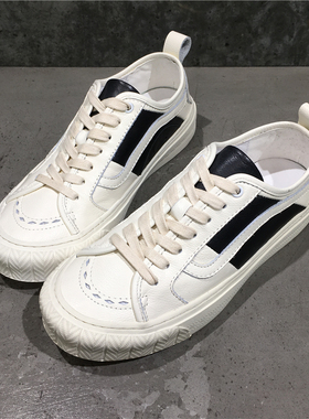 春季百搭休闲男鞋欧洲站潮鞋黑白拼色青年小白鞋雕花真皮低帮板鞋