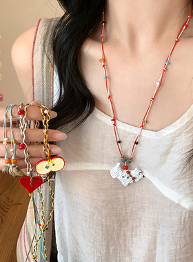 可爱苹果爱心腊肠狗吊坠项链女款彩色编织长款毛衣链小狗挂绳配饰