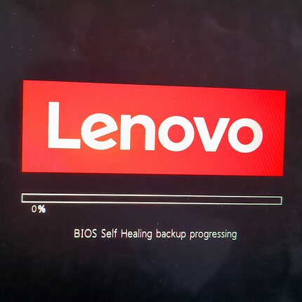 笔记本电脑L14提示Self Healing backup progressing卡机不进BIOS