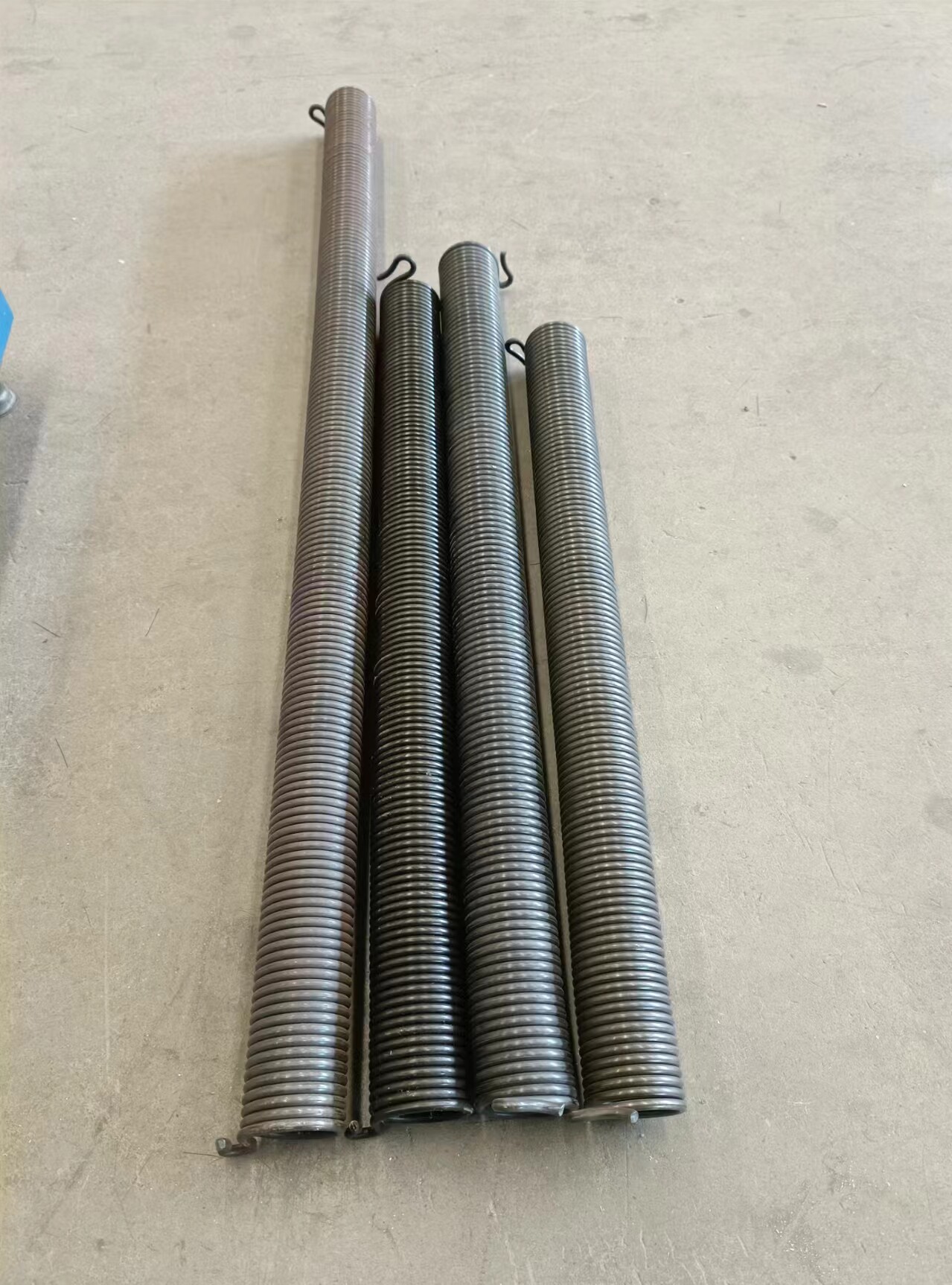 卷帘门车库门弹簧拉力簧车库门配件翻板门扭簧卷帘门专用扭簧