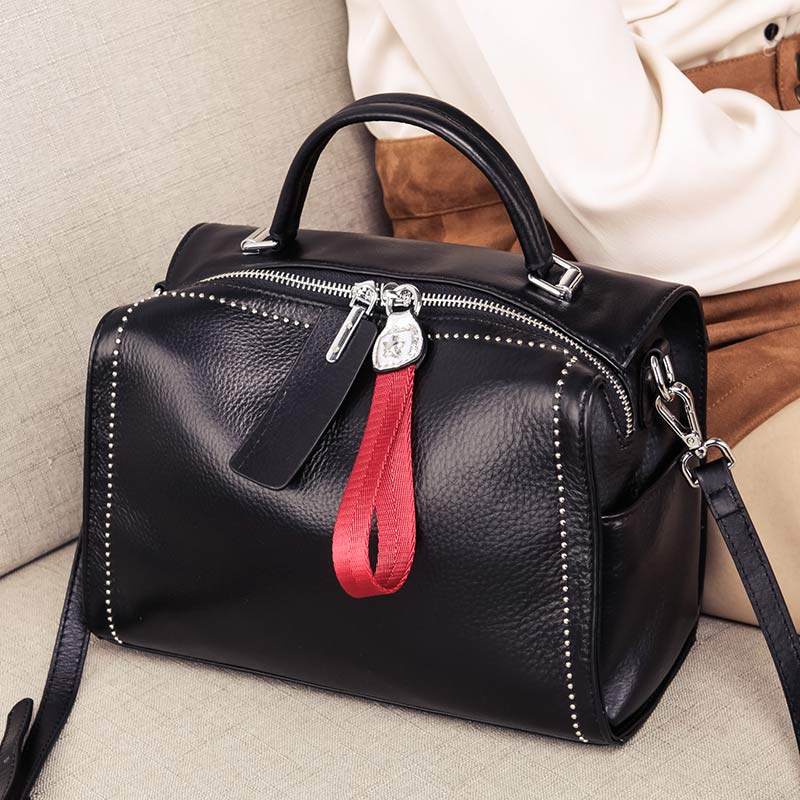 真皮斜挎小包包女2026新款潮时尚宽肩带手提枕头包女士软皮单肩包