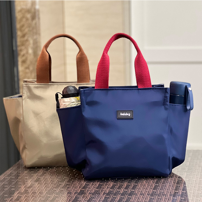 纯色休闲中年女士手提袋妈妈包外出轻便时尚手提包母婴妈咪宝妈包