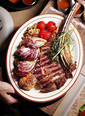 美国Tuxton耐高温西餐盘烤箱加热盘子熟成牛排盘红边线条椭圆平盘