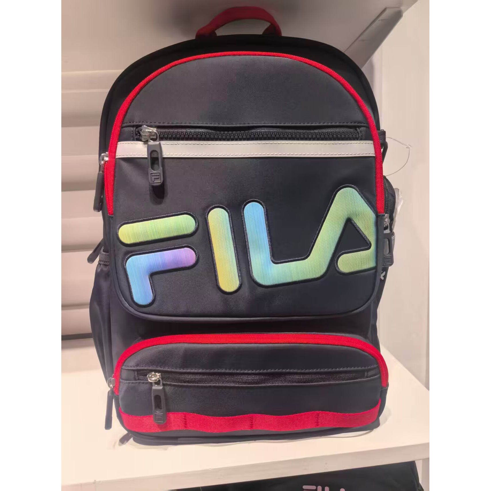 斐乐FILA旋扣减负护脊正品新款百搭运动儿童双肩包学生书包背包