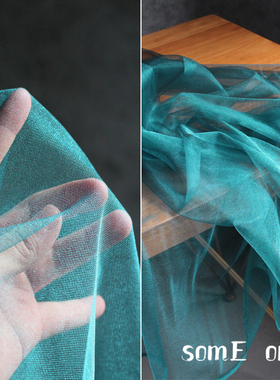 孔蓝色透明加密珠光网纱布料 高密度软糯薄网纱服装设计创意布料