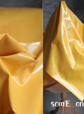 芒果黄色硬挺pu皮革镜面反光造型皮布 服装包袋防水拍摄背景布料