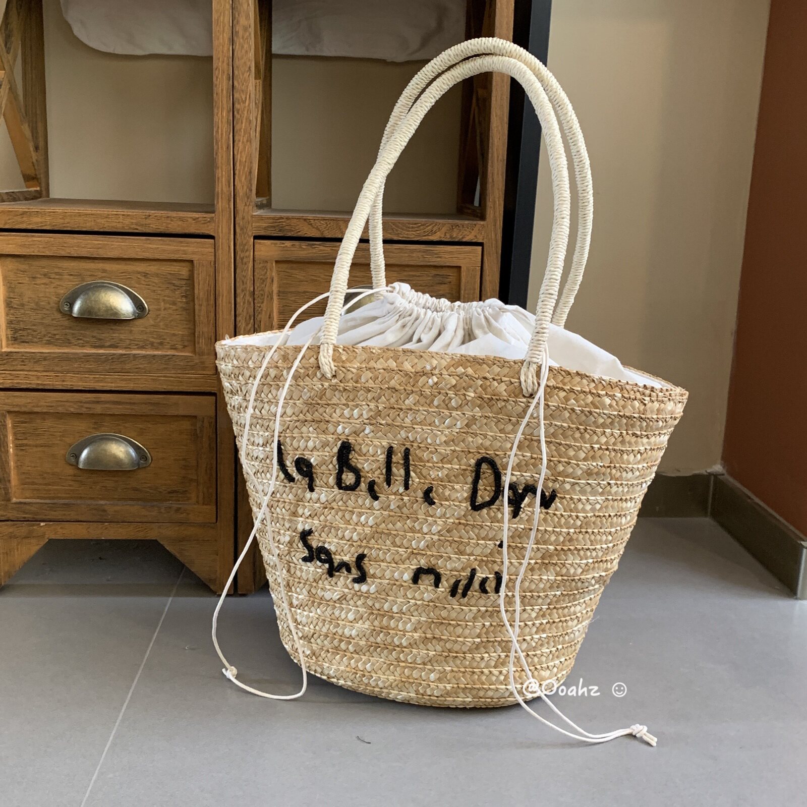 卡农故事 韩国度假风刺绣字母草编包 夏日海边手工编织单肩沙滩包