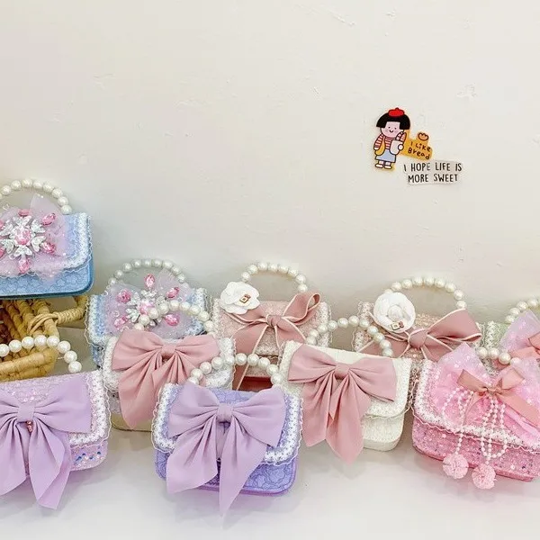 秋冬季韩版蝴蝶结山茶花儿童包珍珠手提蕾丝花边幼儿园女孩斜挎包