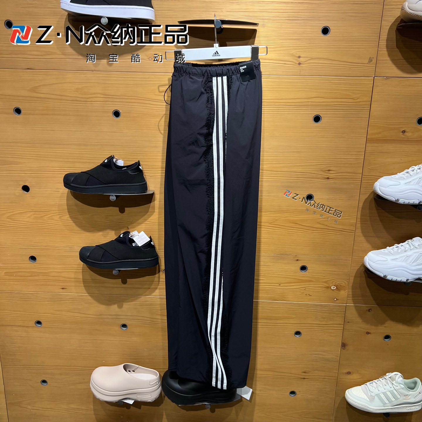 阿迪达斯女子秋防风蕾丝拼接长裤