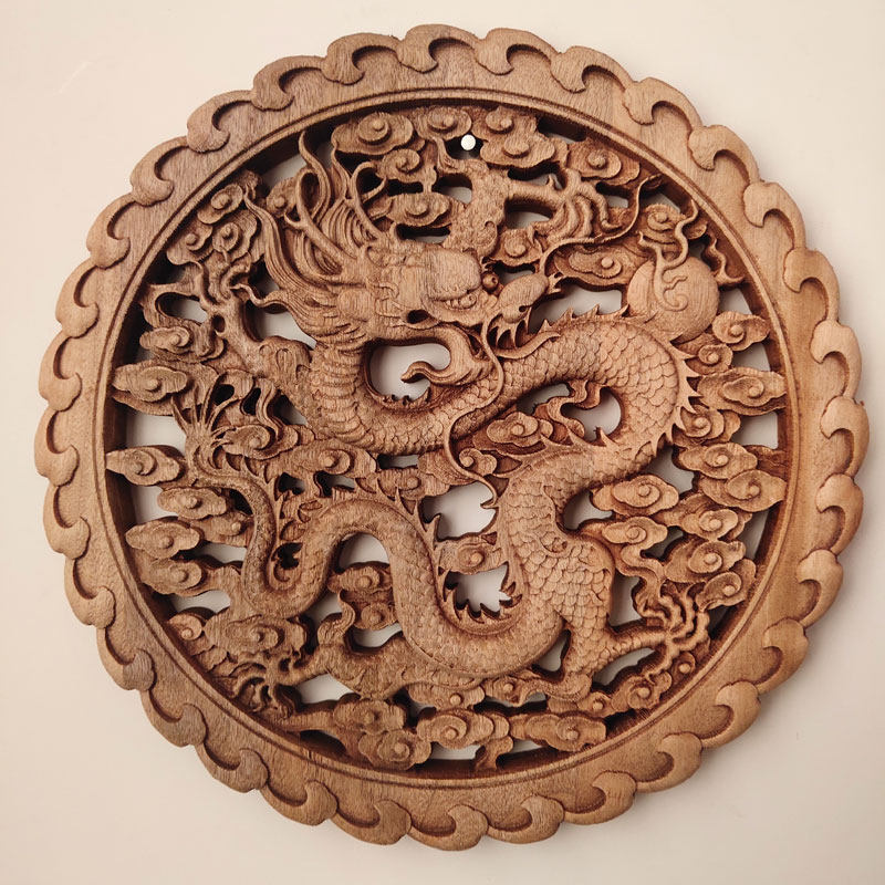 新中式东阳木雕香樟实木头雕刻工艺品挂件圆形客厅玄关壁挂装饰画属于什么档次？