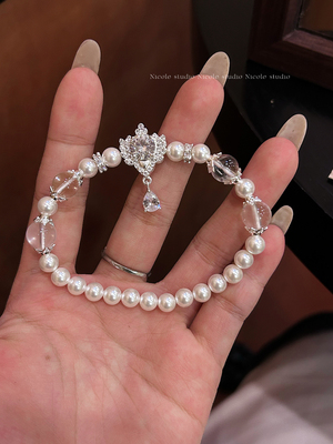 Nicole丘比特爆闪珍珠贝珠手链