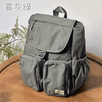 В комплект поставки маленького серо-зеленого размера входит кошелек для монет + изысканный кулон.