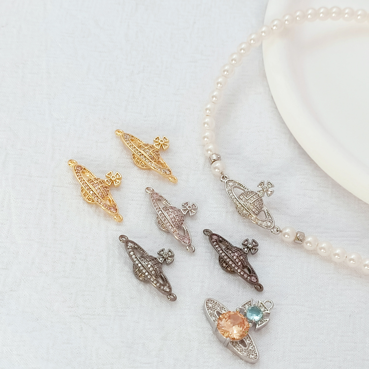 保色包金白K镶锆西太后土星吊坠