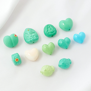 新款菱镁矿爱心鱼桃心通孔配件手工diy手链项链饰品配饰材料散珠