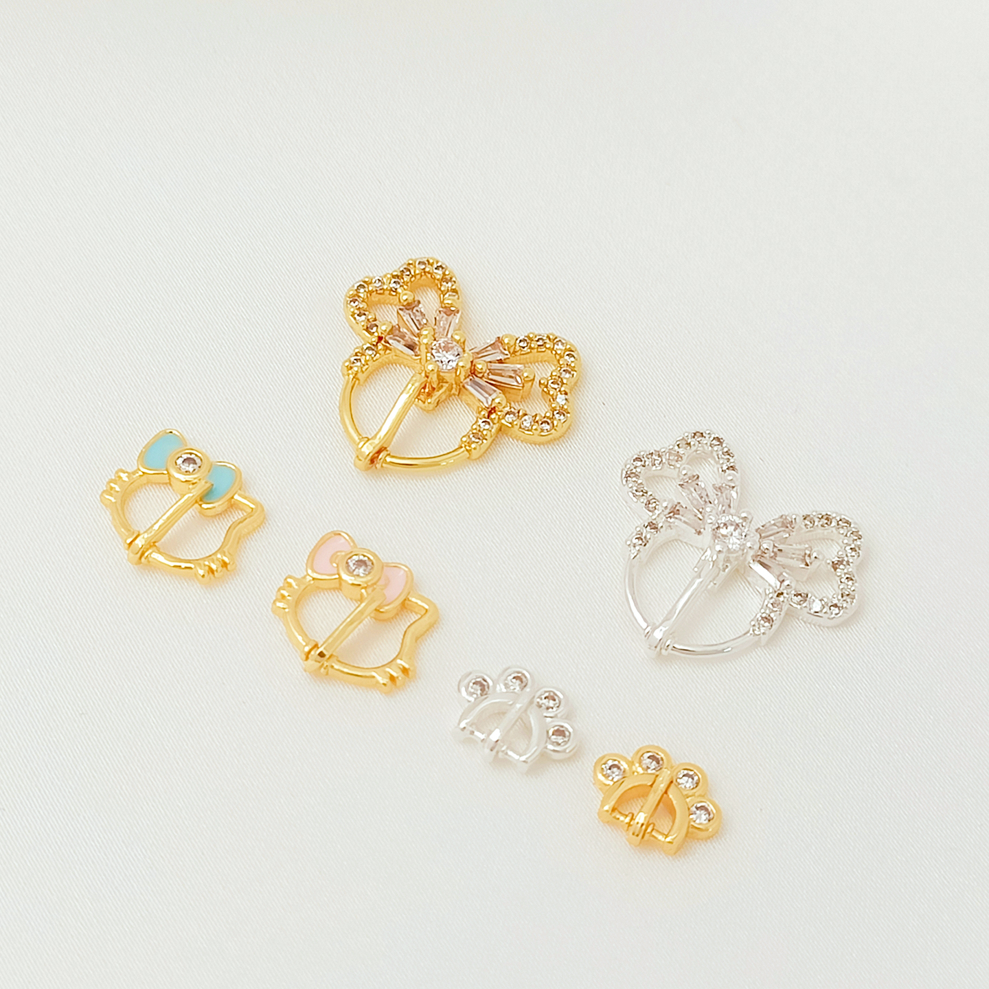 18K铜镀镶锆猫爪蝴蝶结表带扣