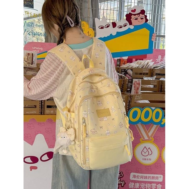专柜品牌温柔奶黄兔印花双肩书包软萌清新小学生3-5年级多口袋校