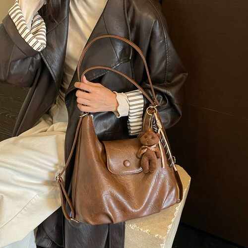 专柜品牌高级感复古大容量包包女2026新款秋冬季通勤双肩后背包单