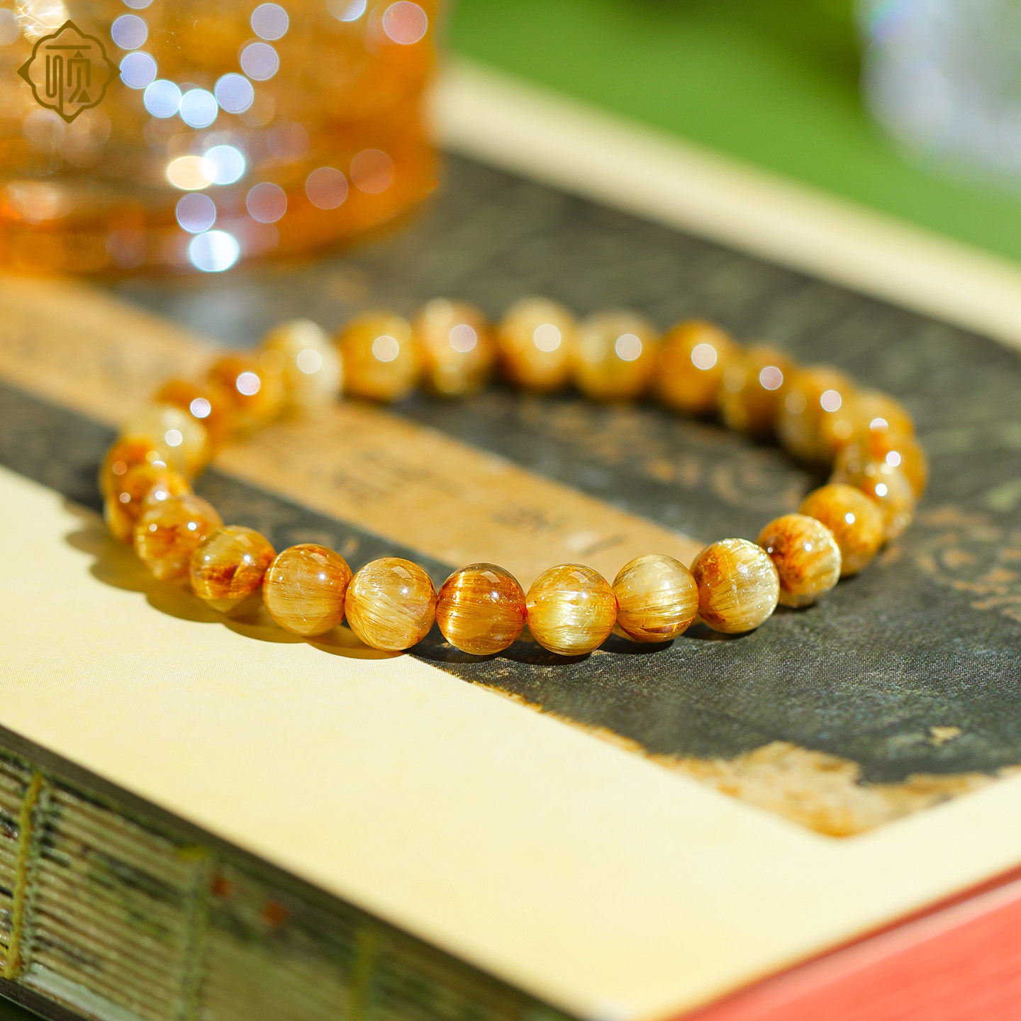 顽石灵 金光闪闪毕业级玻璃体猫眼钛晶圆珠水晶手串W2-134