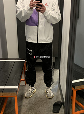 耐克Nike王一博同款双勾LOGO运动休闲梭织收脚束腿长裤DD5125-010