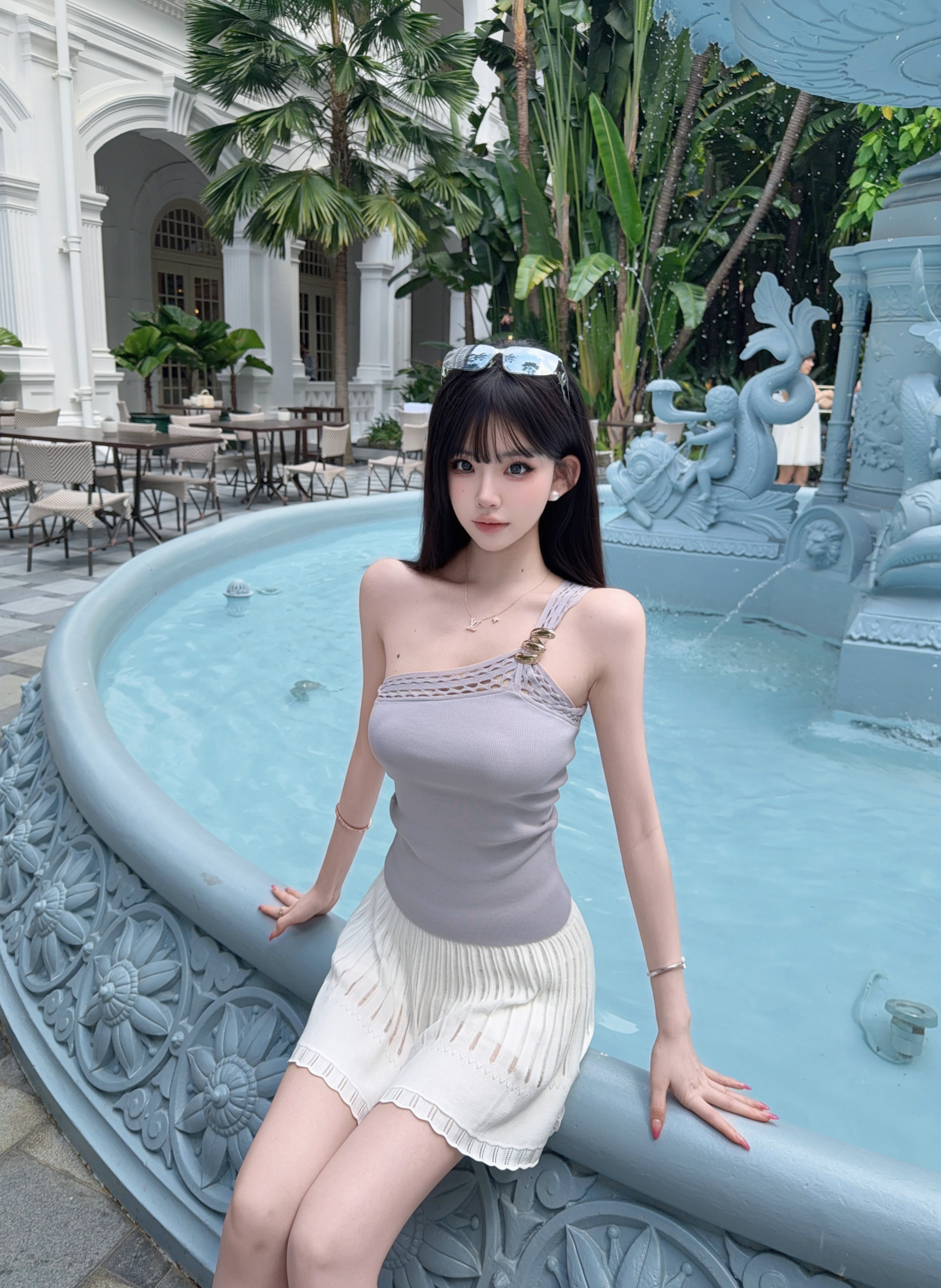 Eva君君酱甜美设计感斜肩镂空挂脖金属扣针织背心女显瘦弹力上衣