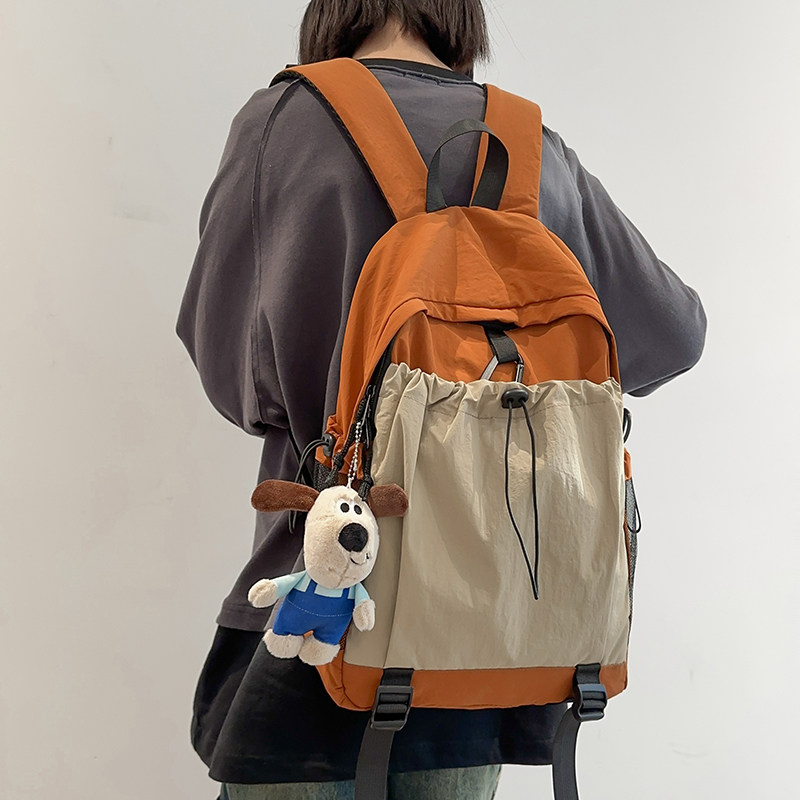 新款撞色高颜值双肩包女大学生户外旅游登山包男百搭潮流减负书包