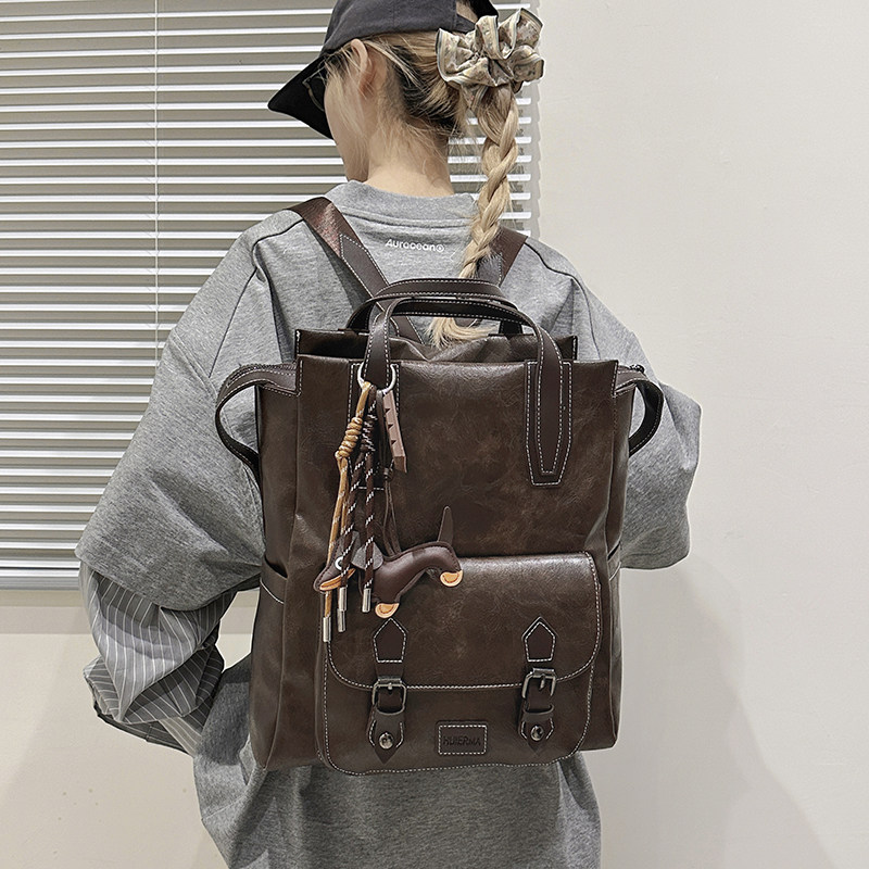 复古英伦双肩包女2026新款通勤百搭大容量旅行背包高中初中书包男