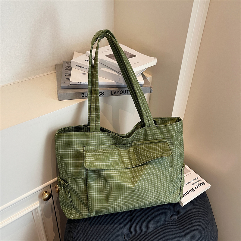 韩系格子简约手提包包女2025新款潮大容量休闲布袋邮差收纳托特包
