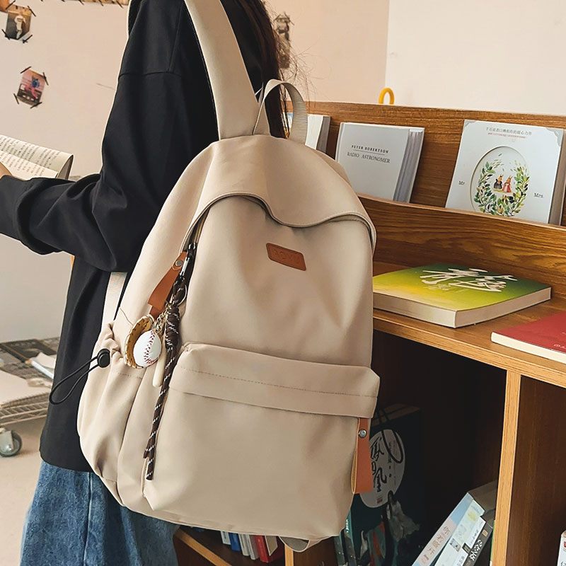 菇八八书包男大学生复古风双肩包