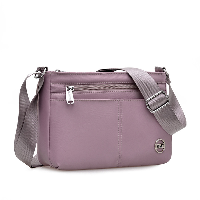 新款女包休闲简约风尼龙小方包女轻便多口袋百搭斜挎包