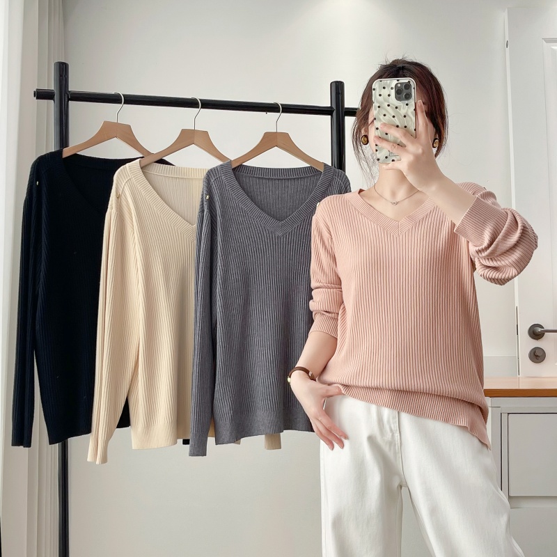 设计感下摆开叉坑条针织衫