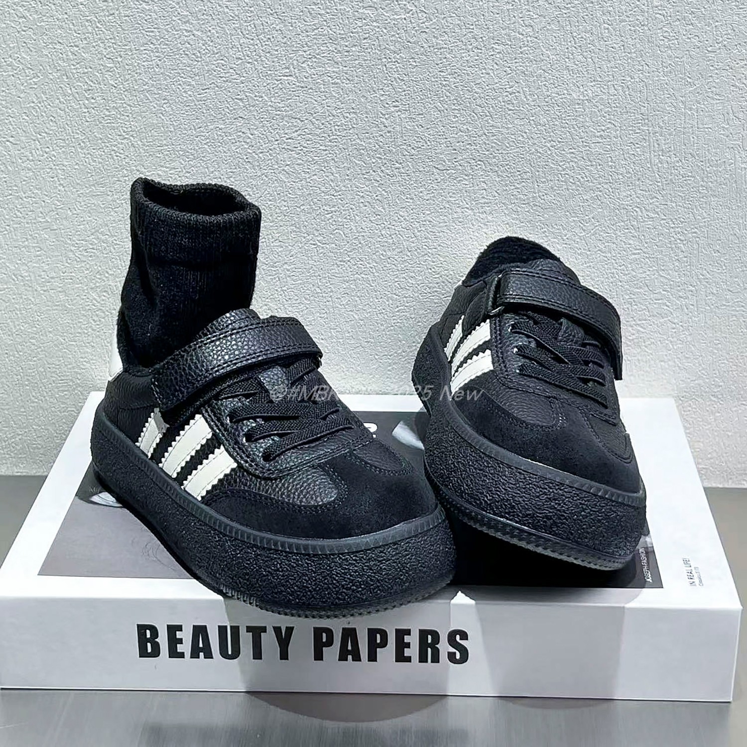 真皮儿童板鞋2025新款黑色德训鞋