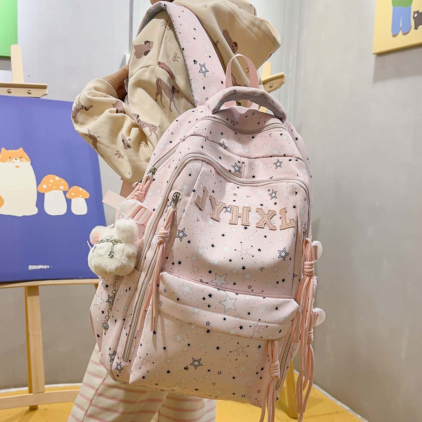 专柜官方初中女生书包大容量高颜值背包星星印花高中生护脊减负新
