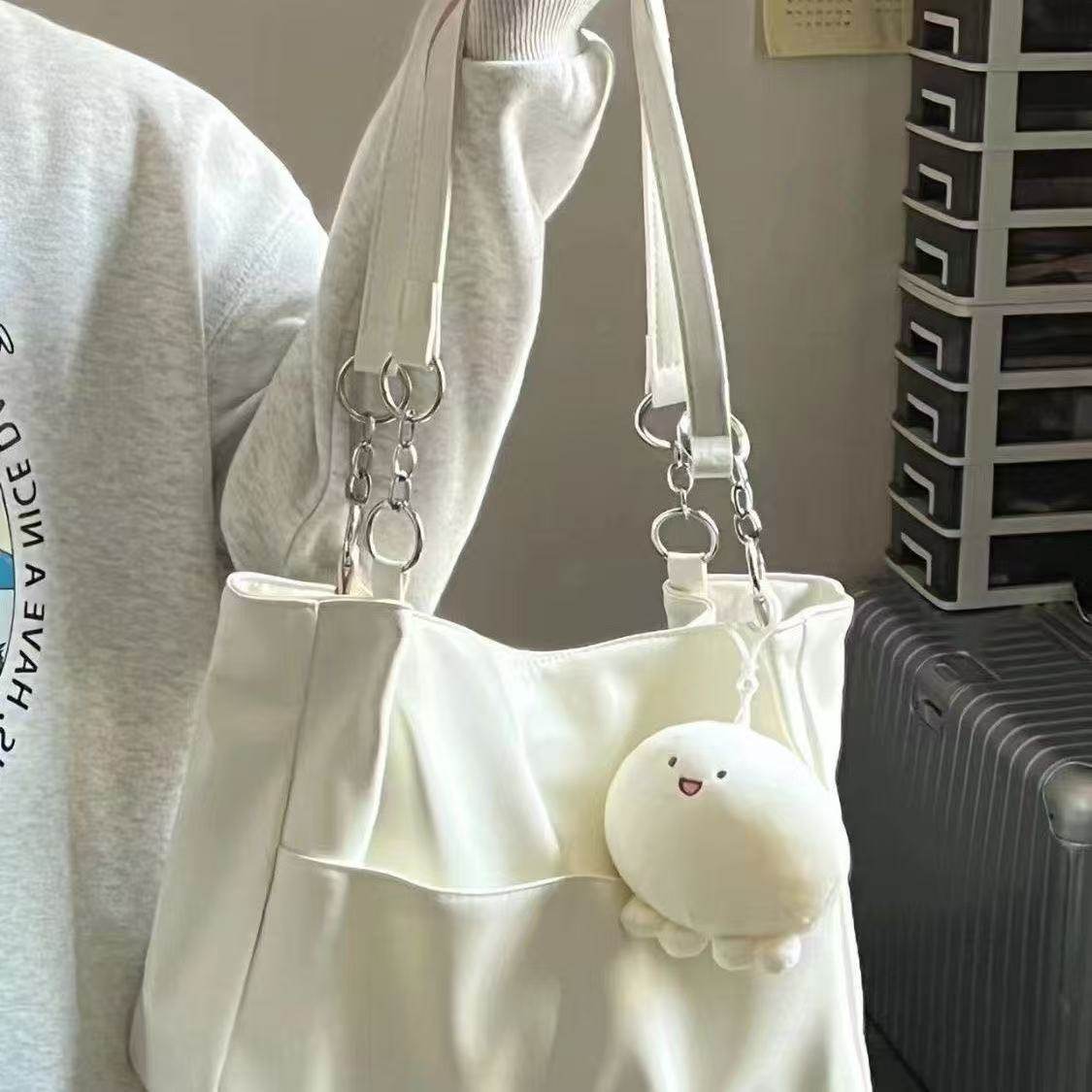 高级感百搭女包2025新款斜挎手提通勤托特包大容量学生上课单肩包,箱包皮具/热销女包/男包,托特包,淘宝优惠券,粉丝福利购,淘宝优惠卷